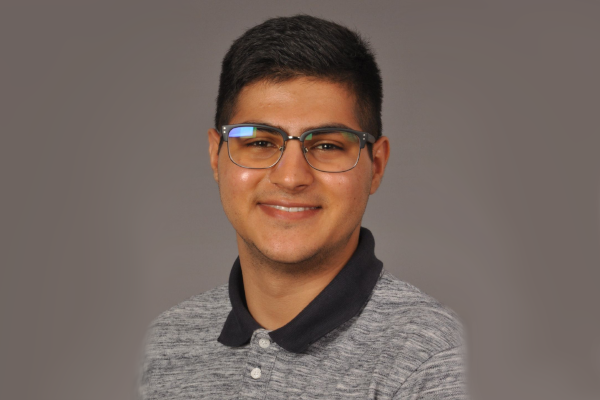 Headshot of Rayyan Zuberi